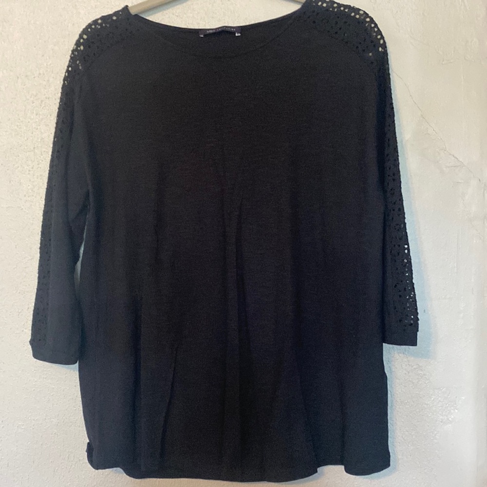 Marks & Spencer size is a UK 16 black three-quarter sleeve with lace sleeve.